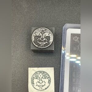 Father Moon Antique Typeset Carved in Metal and Mounted on Wood